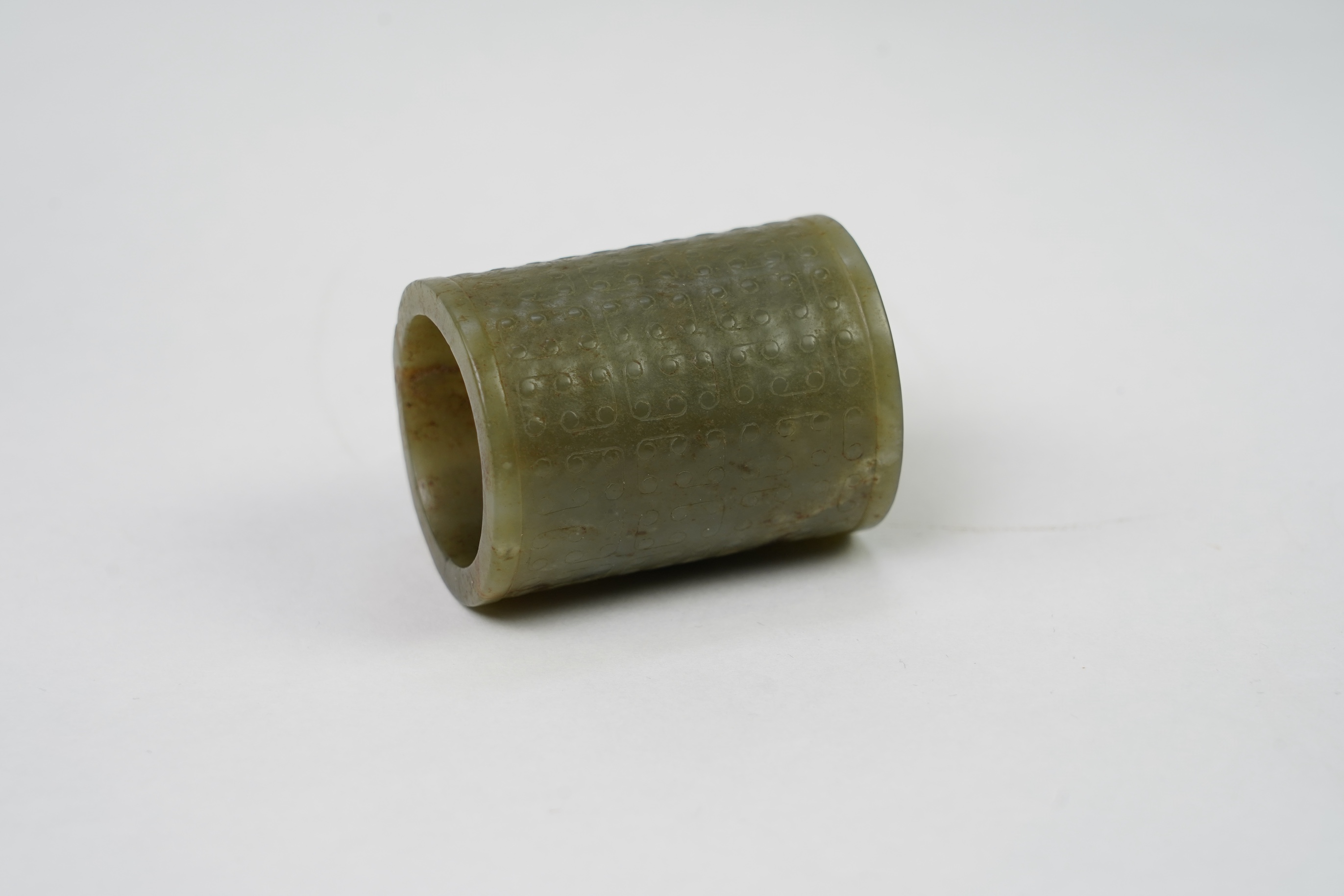 A Chinese green jade cylinder, Warring States period
